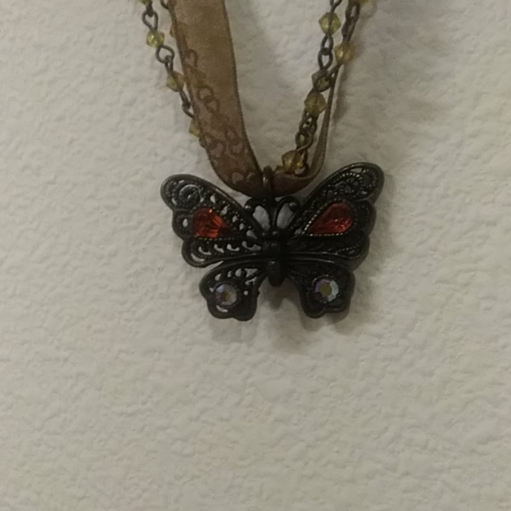 NWOT Brown bead and ribbon chain butterfly necklace. Handmade, one of a kind.